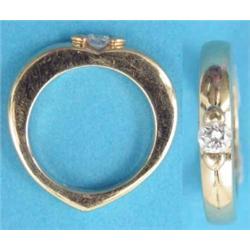 A Piaget 18ct. gold heart shape ring set with a solitaire diamond....