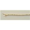 Image 2 : One traditional Tennis Bracelet in 14k yellow gold