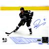 Drew Doughty Signed Los Angeles Kings Skating By 2014 Stanley Cup Logo On Ice 8X10 Photo