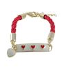 Image 1 : Ivory Enamel Bar With Red Hearts On Red Cord, Gold Plated Brass Bracelet, 5" 1"