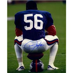 Lawrence Taylor Sitting On Football And Helmet Vertical 16X20 Photo