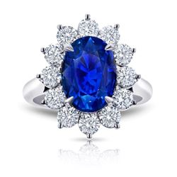 Oval Cut Blue Sapphire With Diamond Halo Platinum Ring