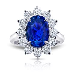 Oval Cut Blue Sapphire With Diamond Halo Platinum Ring