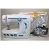 Image 1 : PORTABLE SEWING MACHINE WITH ACCESSORIES