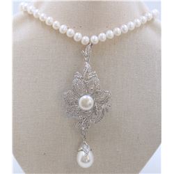 Pendant Gross wt 83.07gr, Gold wt 4.1gr , Silver wt 76.42gr Diamond wt 12.75cts, Gross wt. 67.62gr, 