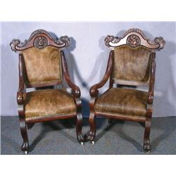 PAIR ANTIQUE CARVED WOOD AND ANIMAL HIDE ARMCHAIRS