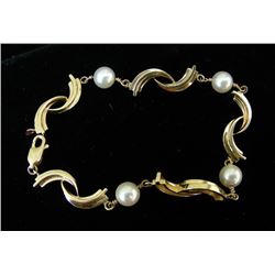 LADIES 14K YELLOW GOLD AND PEARL BRACELET