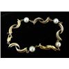 Image 1 : LADIES 14K YELLOW GOLD AND PEARL BRACELET