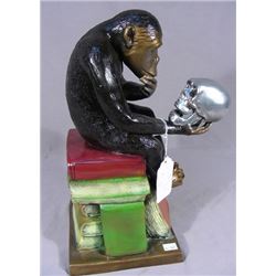 HUMOROUS BRONZE SCULPTURE OF MONKEY WITH SKULL