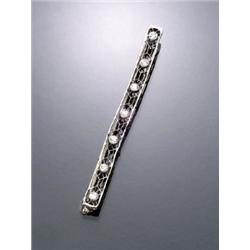 Art Deco Platinum and Diamond Bar Pin, Circa 1930, The rectangular reticulated mount set with...