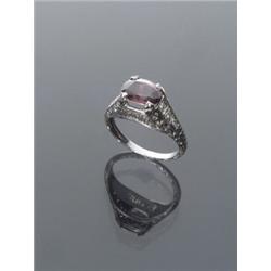 Art Deco Platinum Alexandrite and Diamond Dinner Ring, Circa 1930, Set with one oval faceted...