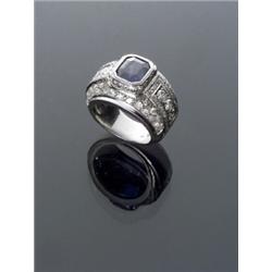 Art Deco Platinum Blue Sapphire and Diamond Dinner Ring, Circa 1935, Set with one octagonal c...