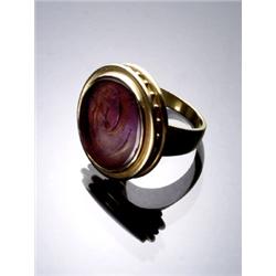 18-Karat Yellow Gold and Intaglio Amethyst Ring, Possibly Ilias Lalaounis, The intaglio is depi...