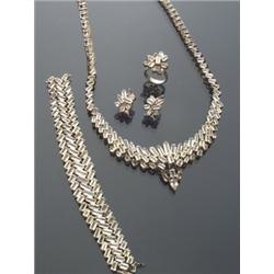 14-Karat Yellow Gold and Champagne Color Topaz Five Piece Ensemble, Consisting of: a princess l...