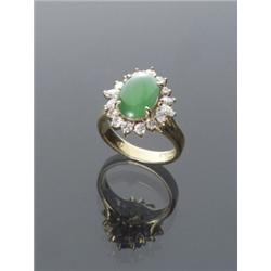 18-Karat Yellow Gold, Natural Burmese Green Jadeite Jade and Diamond Dinner Ring, Set with an o...