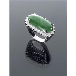 18-Karat White Gold Natural Green Jadeite Jade and Diamond Dinner Ring, Set with an oval caboch...