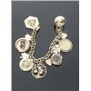 Image 1 : 14-Karat Yellow Gold Charm Bracelet, Suspending eleven assorted 14-karat yellow gold commemorat...
