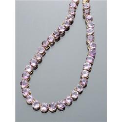 Opera Length Tested 14-Karat Yellow Gold Amethyst Necklace, The single line having thirty-seven...