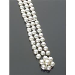 Cultured Pearl and Diamond Bracelet, The triple strand having seventy-two pearls measuring from...