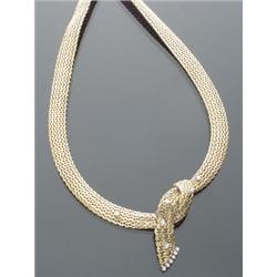 European 18-Karat Yellow Gold and Platinum Choker Necklace, The bottom interlocking motif penda...