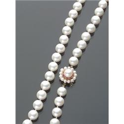 Matinee Length Cultured Pearl and Ruby Necklace, Knotted, The single strand having fifty-eight...