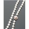 Image 1 : Matinee Length Cultured Pearl and Ruby Necklace, Knotted, The single strand having fifty-eight...