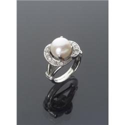 14-Karat White Gold Cultured Pearl and Diamond Dinner Ring, Set with one pearl measuring 9.4 mm...