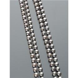 Opera Length Tahitian Black Cultured Pearl, Ruby and Diamond Necklace, Knotted, The double stra...