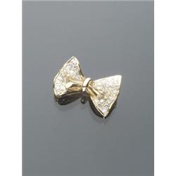 European 18-Karat Yellow Gold and Diamond Bow Tie Pendant-Brooch, Set with a pavÄ of forty-two...