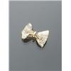 Image 1 : European 18-Karat Yellow Gold and Diamond Bow Tie Pendant-Brooch, Set with a pavÄ of forty-two...
