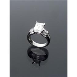 Platinum Solitaire Diamond Ring, The platinum four prong A-box mount set with one rectangular e...