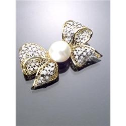 18-Karat Yellow and White Gold South Sea Pearl and Diamond Bowknot Brooch, Set with one pearl m...