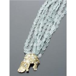 Matinee Length Aquamarine and Diamond Necklace, Having four individual strands of approximately...