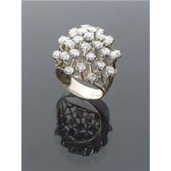 Tested 14-Karat Yellow and White Gold Diamond Cluster Ring, Set with thirty-one round brilliant...