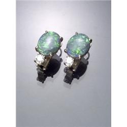 Pair of 18-Karat White Gold French Clip-Back Black Opal and Diamond Earrings, Each set with one...