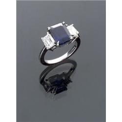 Platinum Blue Sapphire and Twin Diamond Dinner Ring, Set with one rectangular cut sapphire weig...