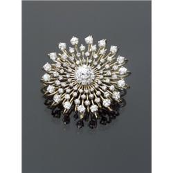 Tested 14-Karat Yellow and White Gold Diamond Floral Spray Brooch, Set with one old mine cut di...