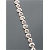 Image 1 : 14-Karat Yellow Gold, Ruby and Diamond Flexible Bracelet, Set with sixteen oval faceted rubies...