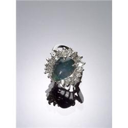 Platinum, Emerald and Diamond Dinner Ring, Set with one cabochon pear shape emerald weighing ap...