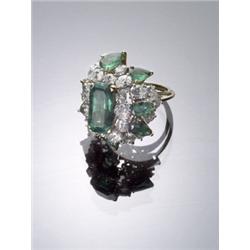 18-Karat Yellow and White Gold, Emerald and Diamond Cluster Dinner Ring, Set with one octagonal...