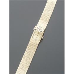 18-Karat Yellow and White Gold and Diamond Concealed Face Lady's Manual-Wind Wristwatch, Bucherer...