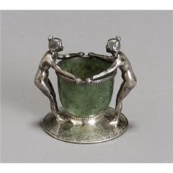 Cartier Sterling and Jade Figural Cup, Circa 1950s, The spinach green nephrite jade cup flank...