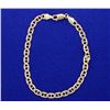 Image 1 : 7 1/2 inch 10k yellow gold link style bracelet.