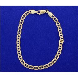 7 1/2 inch 10k yellow gold link style bracelet.