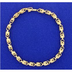 6 7/8 inch Gold Designer Bracelet