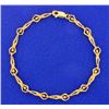 Image 1 : Unique Gold Acrobat Bracelet