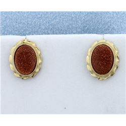 Goldstone Bezel Set into 14K Gold Earrings