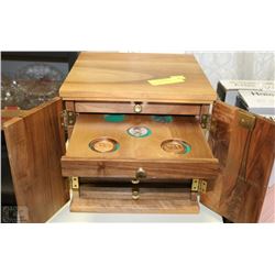 1976 OLYMPIC COIN BOX WITH SOME COINS AND KEY