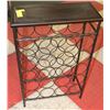 Image 1 : BLACK WROUGHT IRON WINE RACK. HOLDS 20 BOTTLES