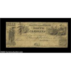Raleigh, NC- Bank of the State of North Carolina $50 G298 Pennell 1235Both the counterfeit and the g